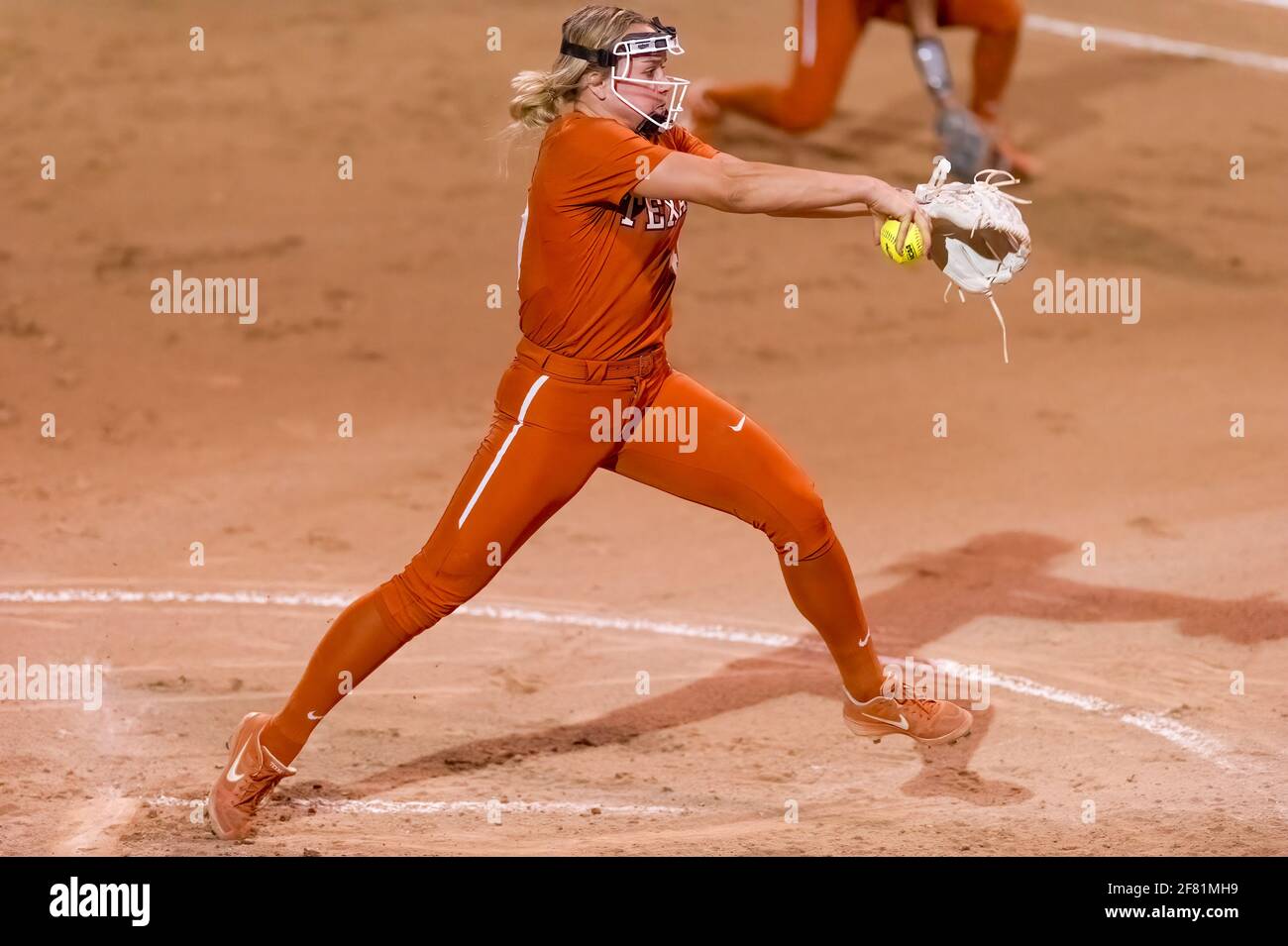 Texas Longhorn Pitcher Miranda Elish Is Winding Up For a Pitch to Plate Stock Photo