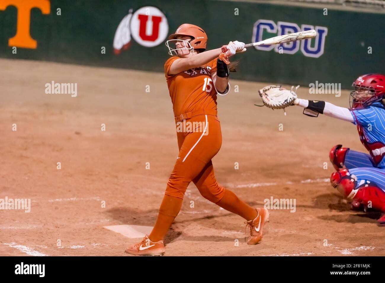A Texas Longhorn Player Is Batting Against The Ole Miss Rebels At The