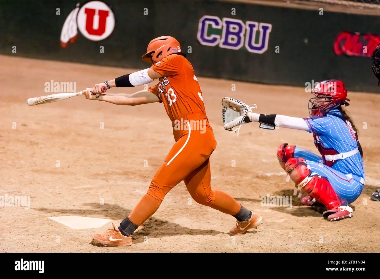 A Texas Longhorn Player Is Batting Against The Ole Miss Rebels At The