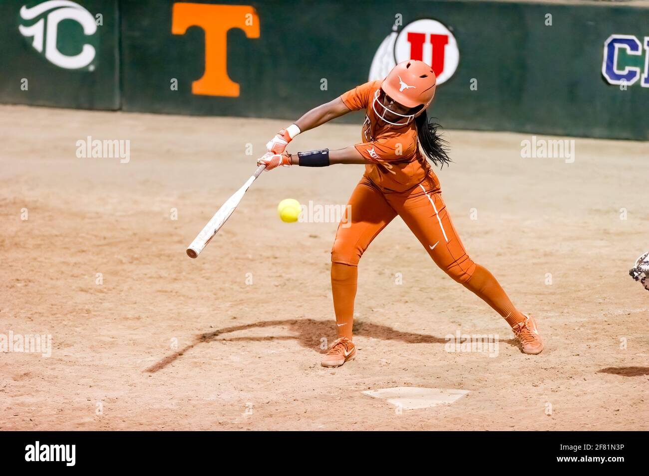A Texas Longhorn Player Is Batting Against The Ole Miss Rebels At The