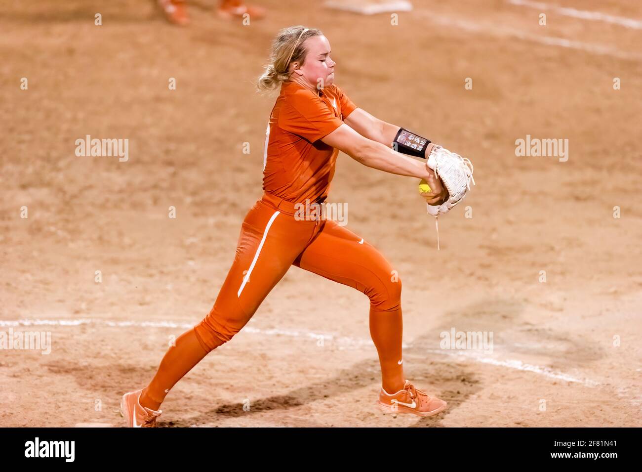 Texas Longhorn Pitcher Miranda Elish Is Winding Up For a Pitch to Plate Stock Photo