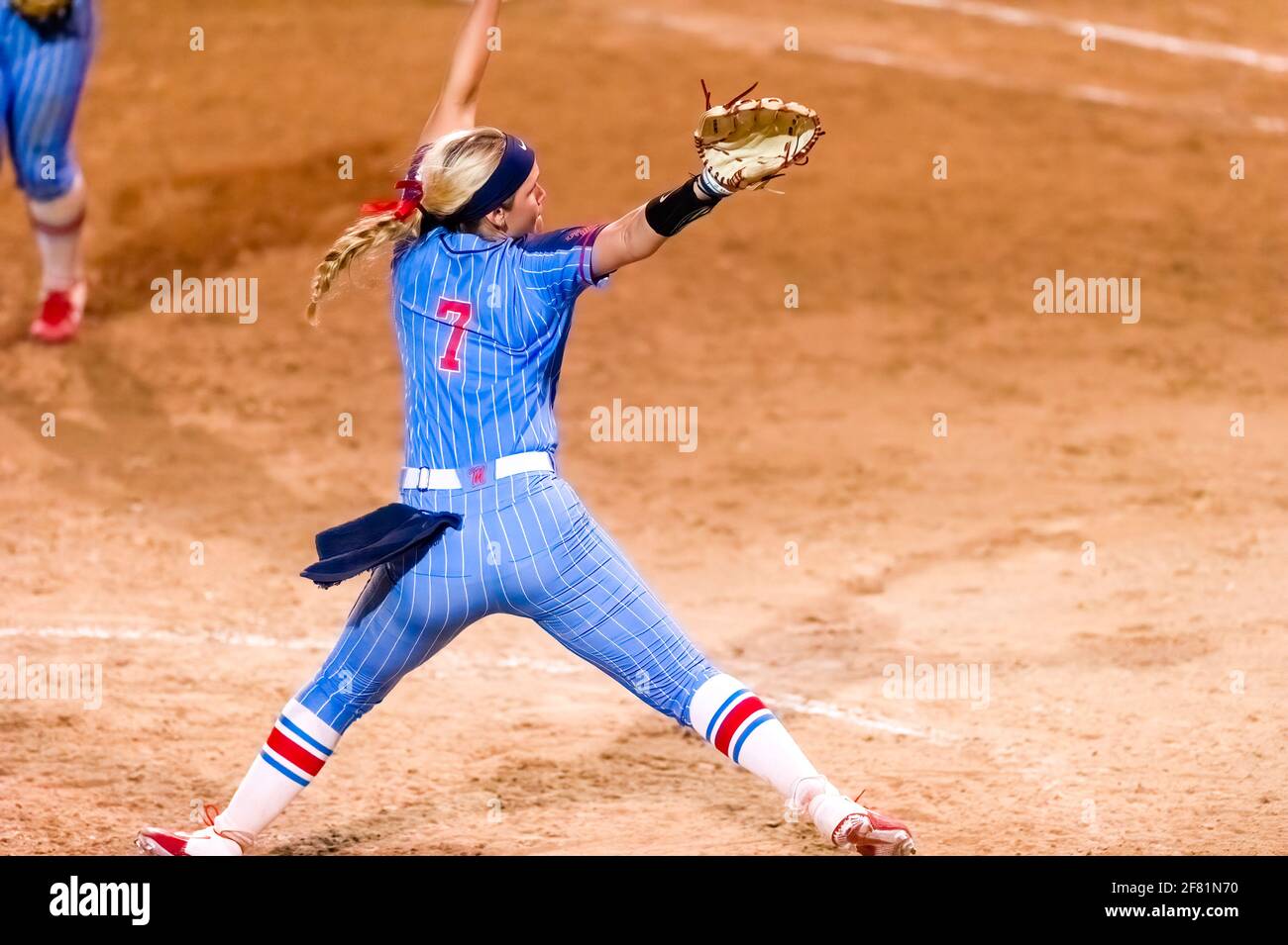 The Ole Miss Rebel Pitcher Is Winding Up To Make a Pitch To Home Plate Stock Photo
