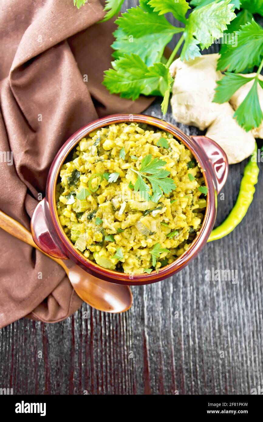 Indian national dish kichari made of mung bean, rice, celery, spinach