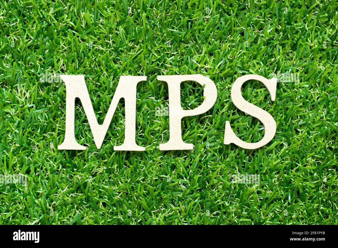 Alphabet letter in word MPS (Abbreviation of Master Production Schedule or Mucopolysaccharidosis) on green grass background Stock Photo