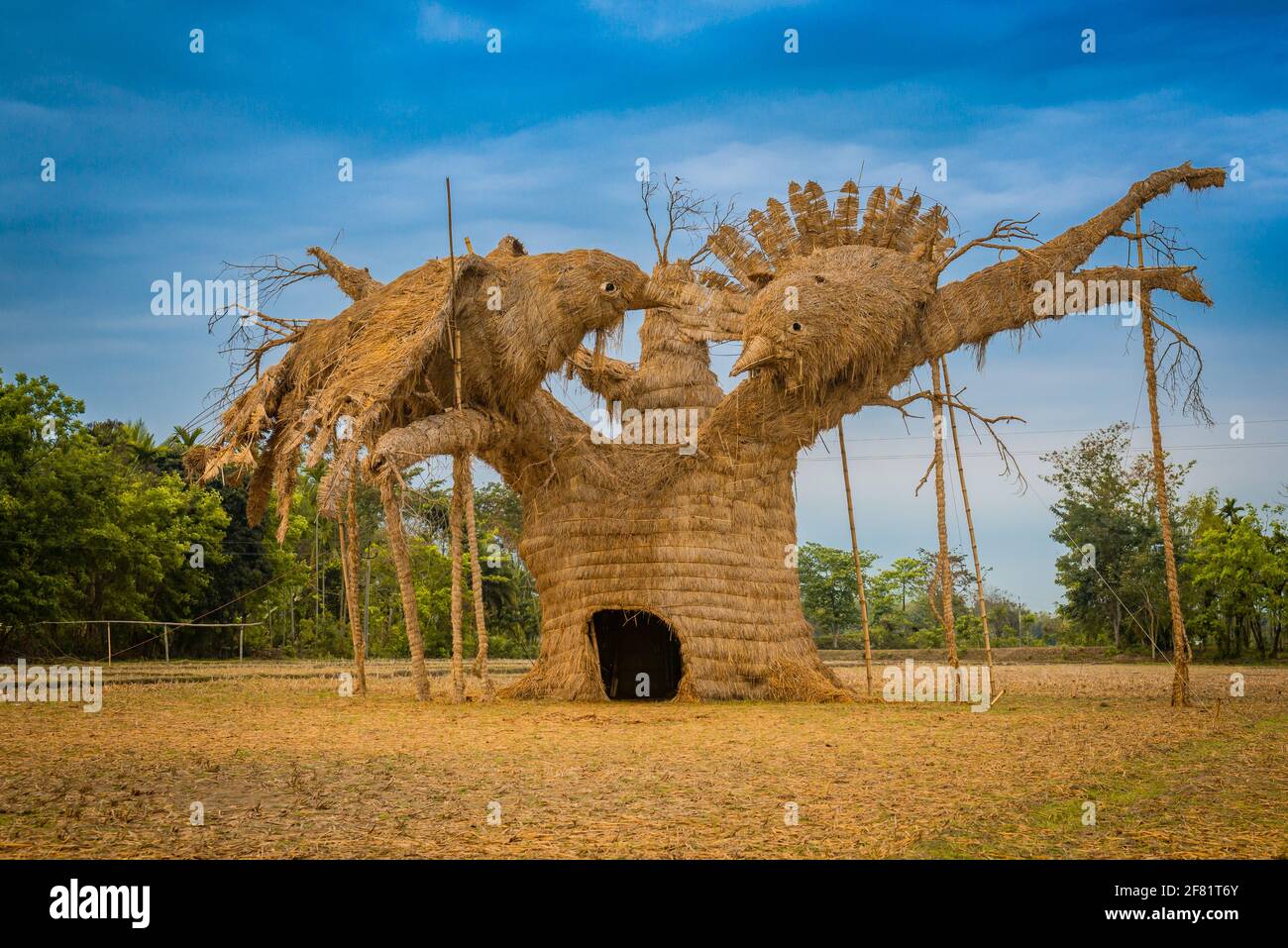 A village of Assam creates artistic and beautiful Maji (A stack of wood and bamboo ). On the occasion of the Magh Bihu Festival. Assam, India. Stock Photo