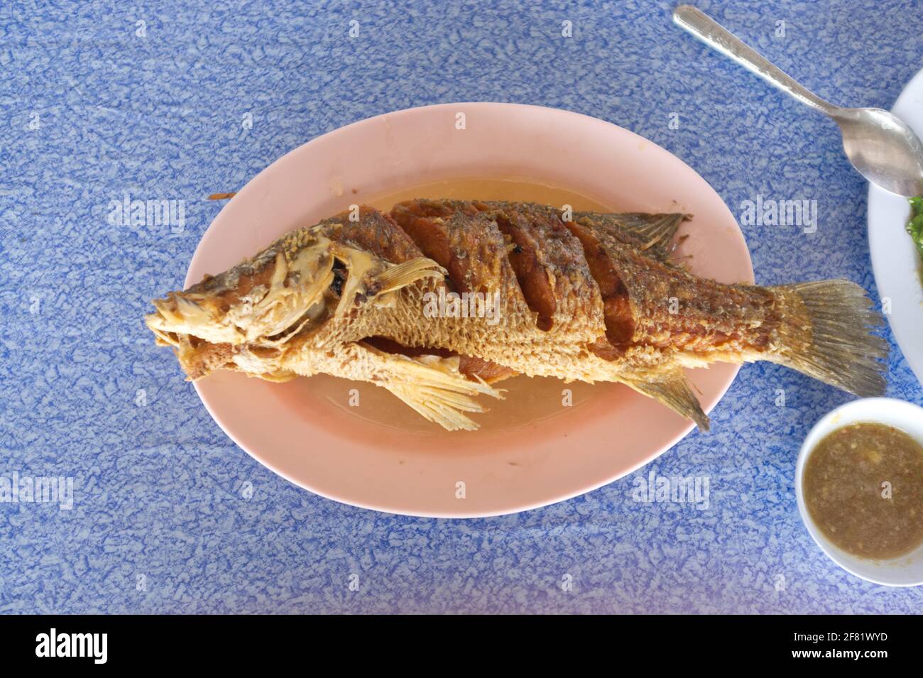 Snapper topped with sauce , Thai seafood Stock Photo