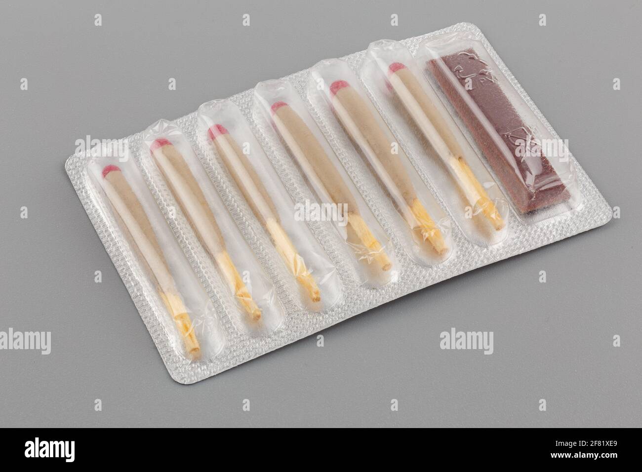 stormproof survival matches in blister from dry ration on gray background. Stock Photo