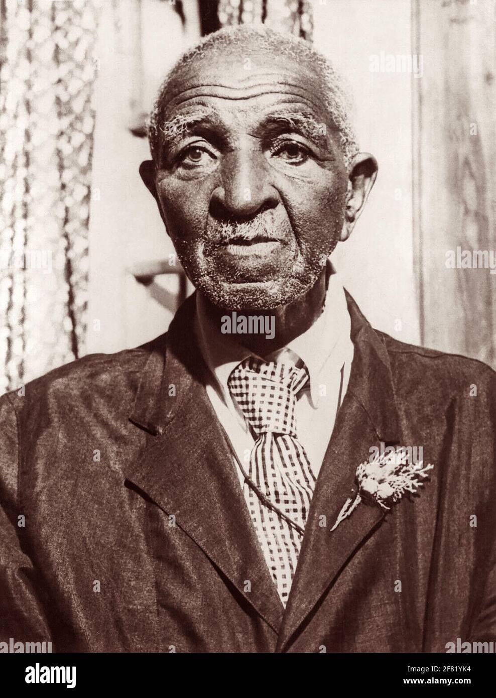 Portrait of George Washington Carver (c1864-1943) during Carver's visit on July 21, 1942, to the Ford Motor Company's George Washington Carver Nutrition Laboratory in Dearborn, Michigan. (USA) Stock Photo
