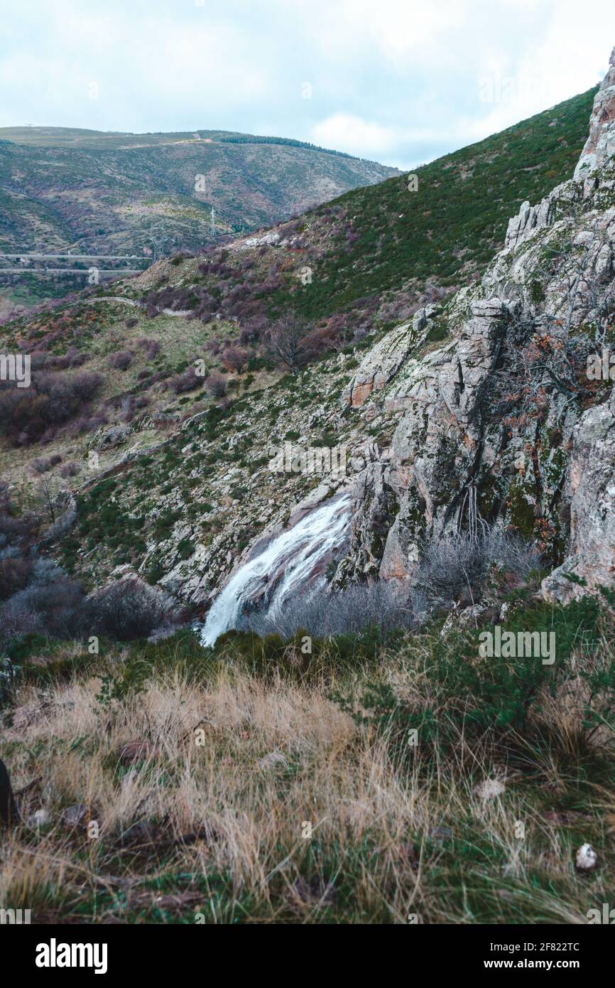 Beautiful shot of a waterfall in a mountainous area Stock Photo - Alamy