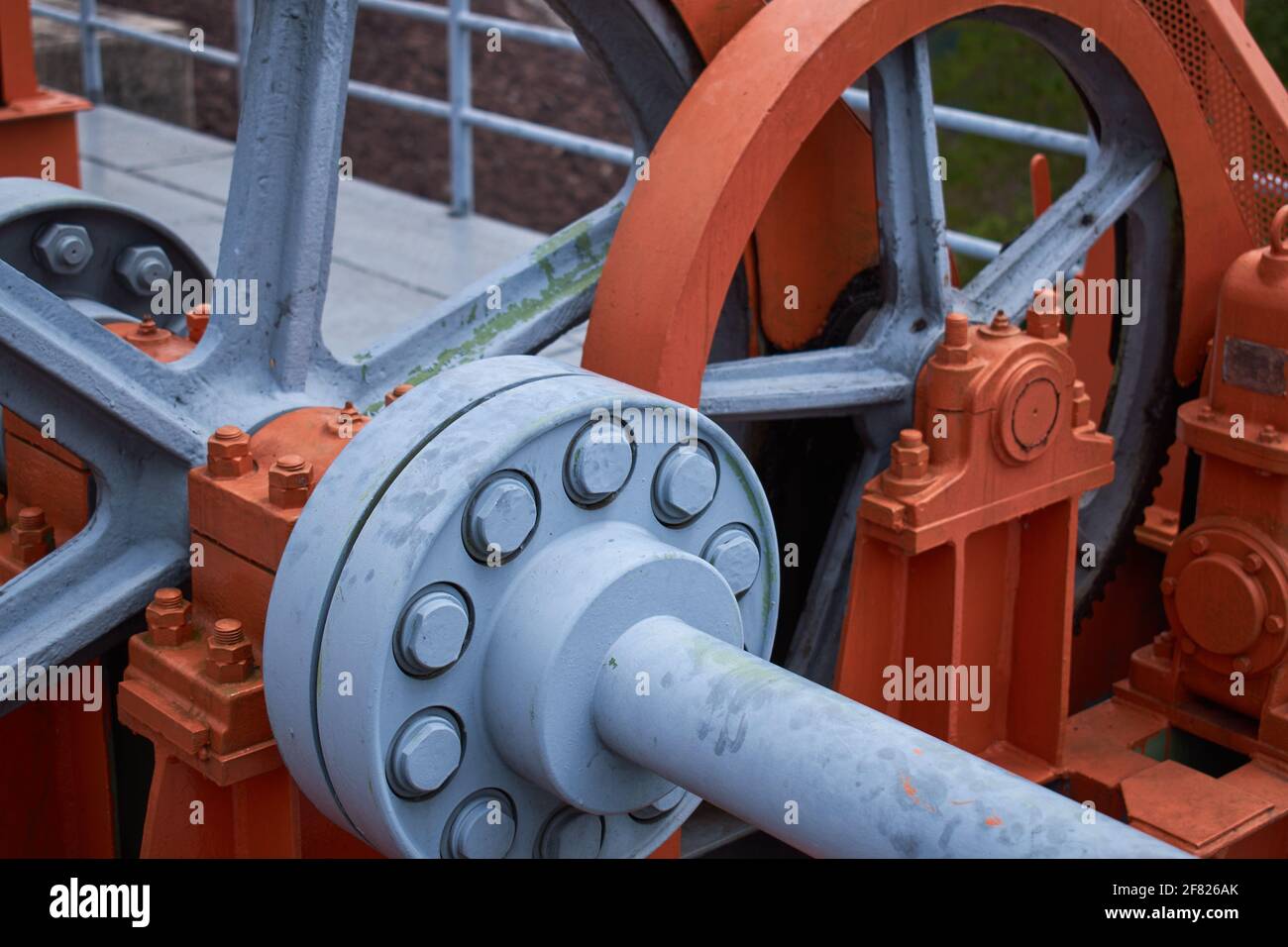 Close-up of a large orange mechanical part Stock Photo