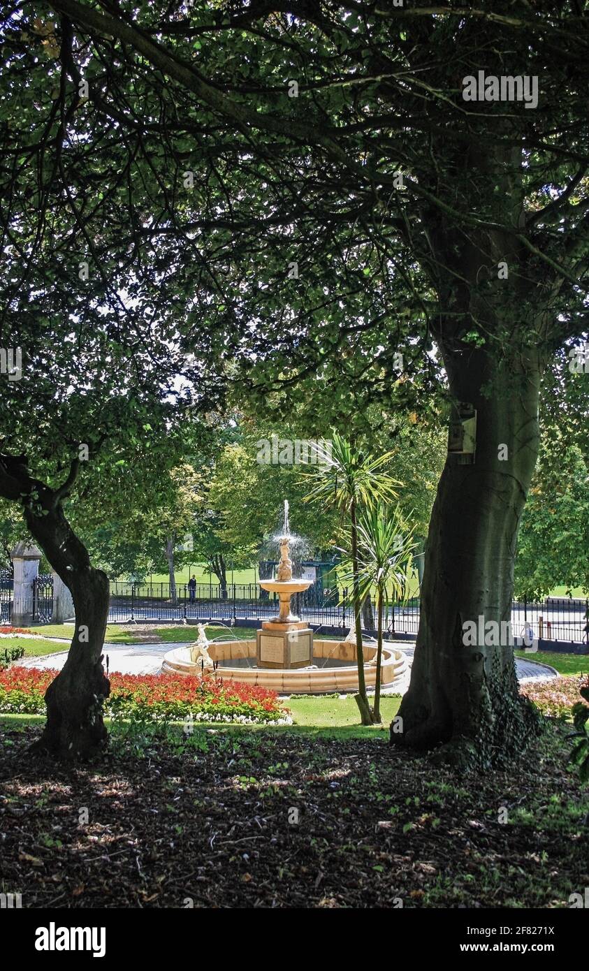 Devonport Park in Plymouth is often refered to as the Peoples Park. The Napier Fountain dedicated to Sir Charles Napier seen in full flow. Stock Photo