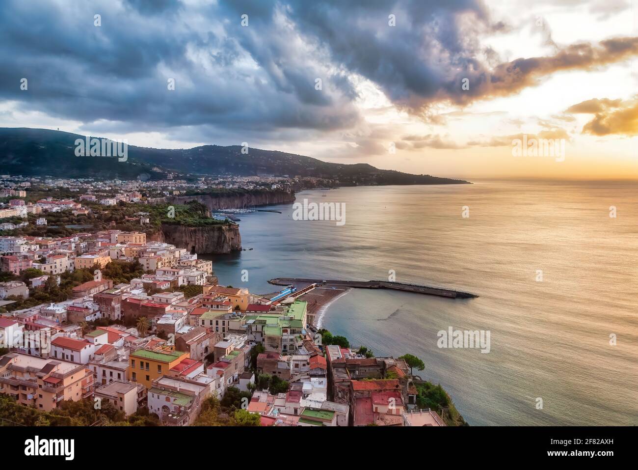 Sunset over the Sorrento coastline. Sorrento is a town overlooking the Bay of Naples in Southern Italy. Is become a popular tourist destination Stock Photo