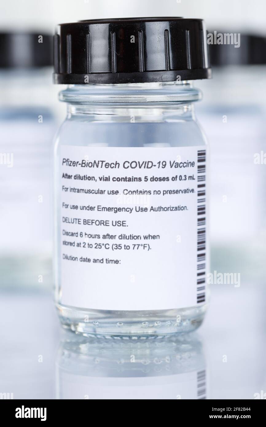 Stuttgart, Germany - March 19, 2021: Biontech Pfizer Coronavirus Vaccine Corona Virus COVID-19 Covid vaccines portrait format in Germany. Stock Photo