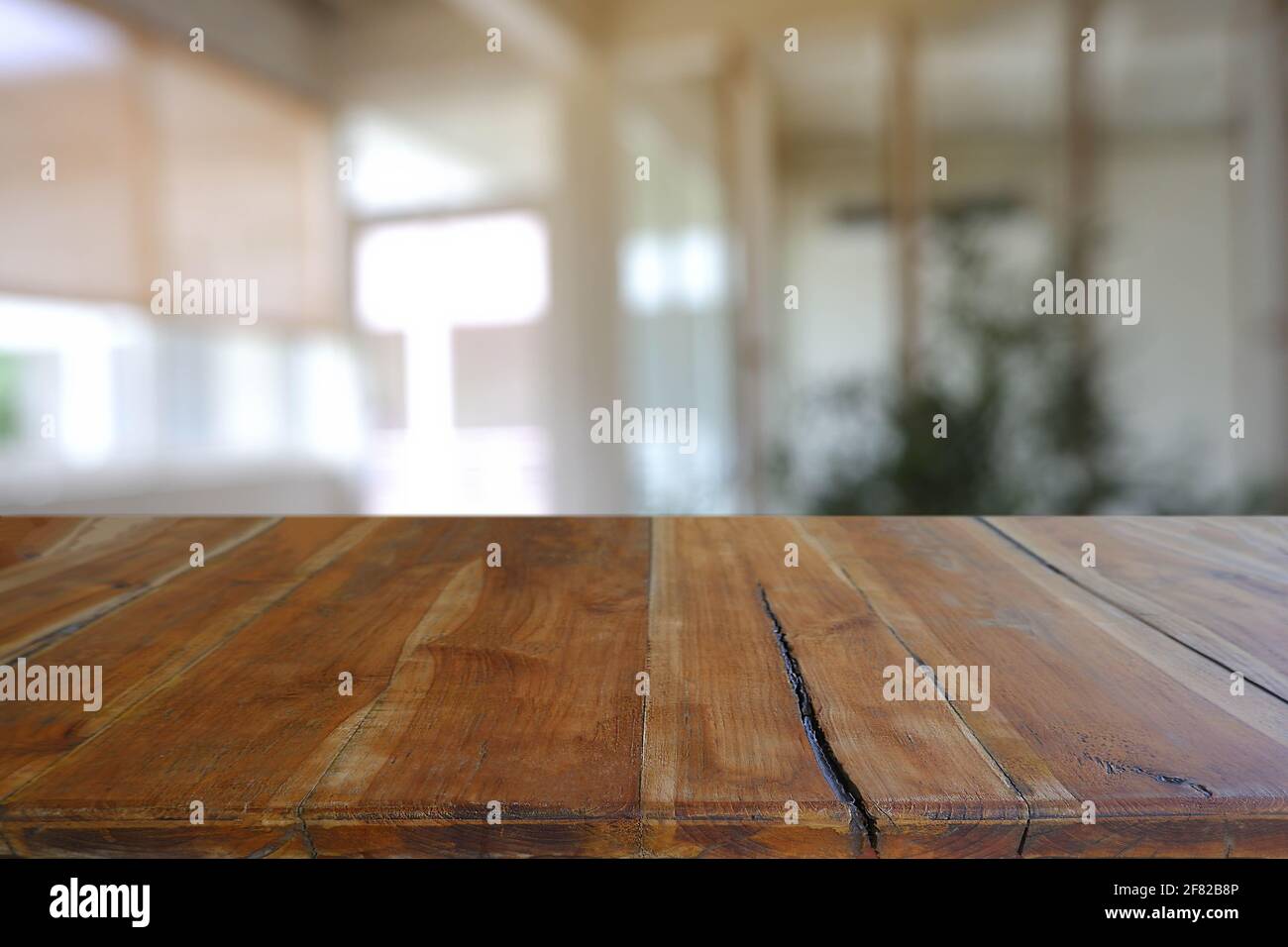 Empty wooden table in front of abstract blurred Cafe, restaurant at ...
