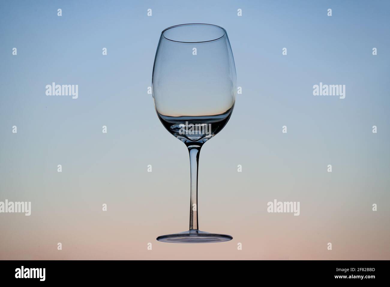 Single empty wine glass on hi-res stock photography and images - Alamy