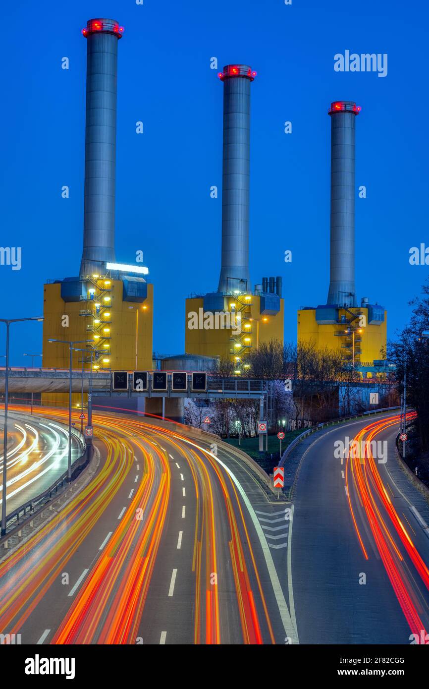 Power station and highway at night seen in Berlin, Germany Stock Photo