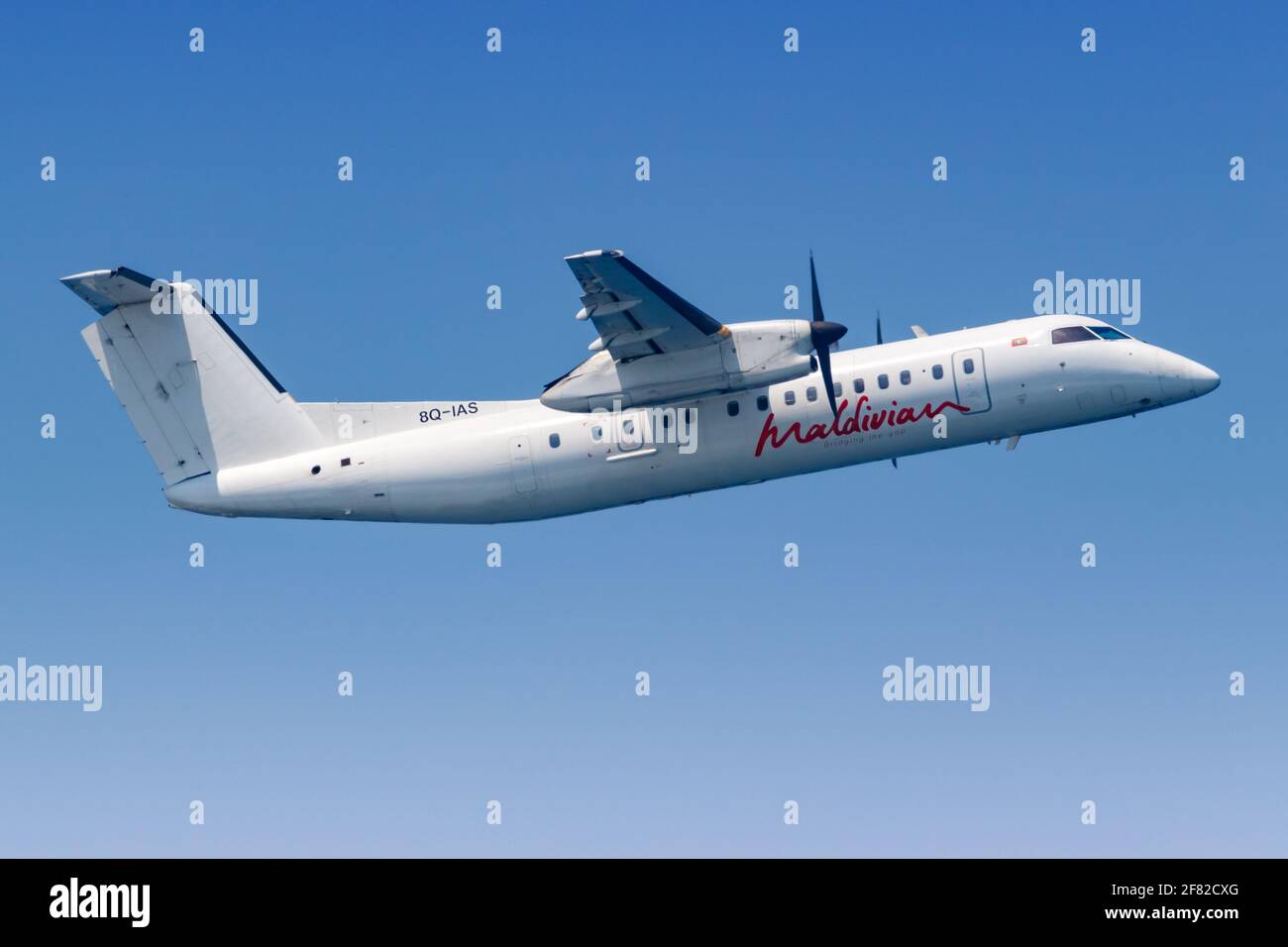 Male, Maldives – February 20, 2018: Maldivian Bombardier DHC-8-300 airplane at Male airport (MLE) in the Maldives. Stock Photo