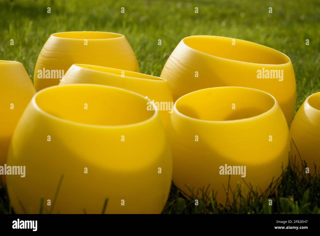 Bright yellow beeswax candle lights Stock Photo