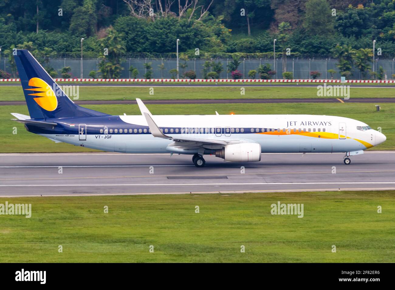 Changi, Singapore – January 29, 2018: Jet Airways Boeing 737-800 airplane at Changi airport (SIN) in Singapore. Boeing is an American aircraft manufac Stock Photo