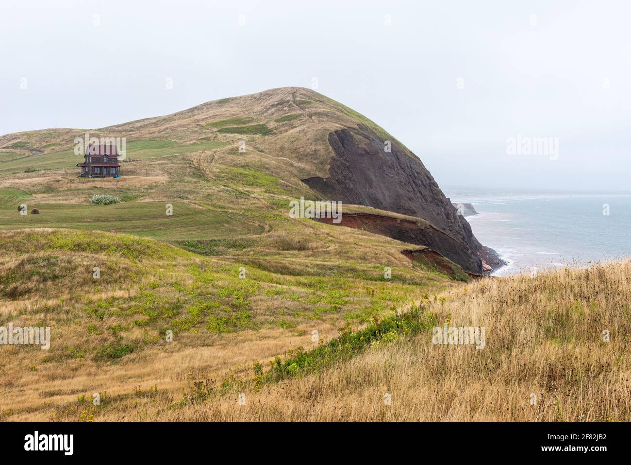 The eroded coast of the isle of Havre Aubert in the Magdalen Islands (Iles-de-la-Madeleine). Stock Photo