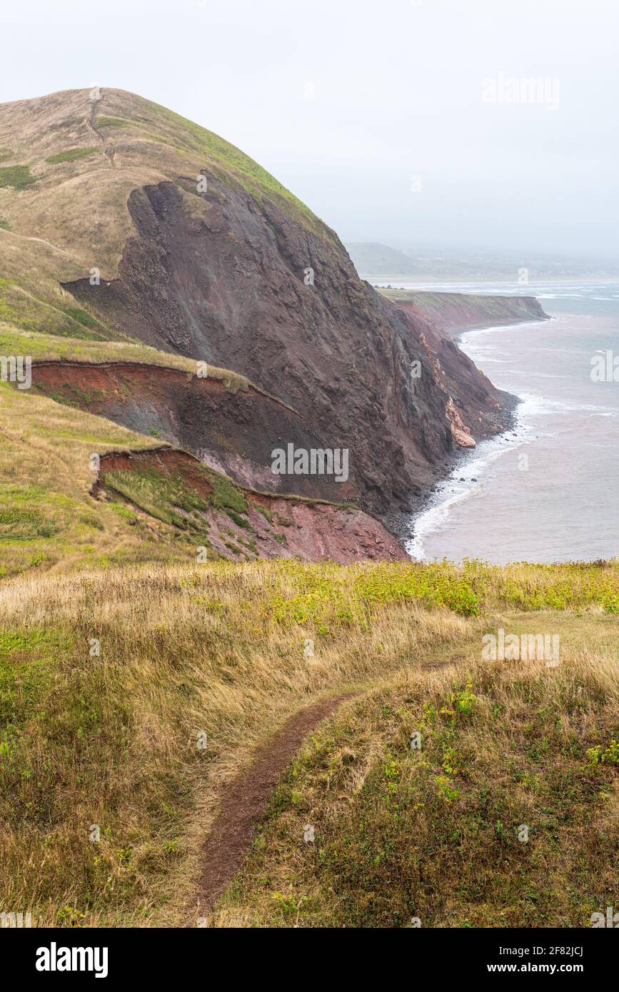 The eroded coast of the isle of Havre Aubert in the Magdalen Islands (Iles-de-la-Madeleine). Stock Photo