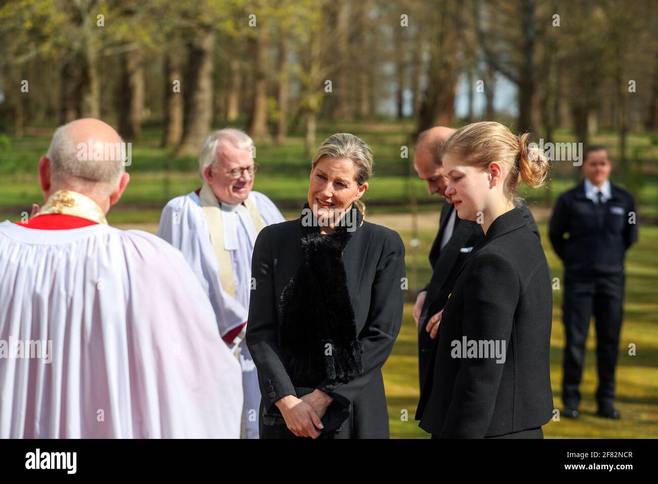 The Earl and Countess of Wessex, with their daughter Lady Louise Windsor, talk to Cannon Martin Poll, Domestic Chaplin to Her Majesty The Queen, as they attend the Sunday service at the Royal Chapel of All Saints at Royal Lodge, Windsor, following the announcement on Friday April 9, of the death of the Duke of Edinburgh at the age of 99. Picture date: Sunday April 11, 2021. Stock Photo