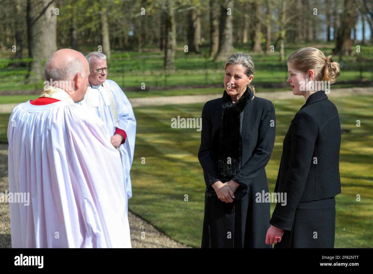 The Countess of Wessex, with her daughter Lady Louise Windsor, talks to Cannon Martin Poll, Domestic Chaplin to Her Majesty The Queen, as they attend the Sunday service at the Royal Chapel of All Saints, Windsor, following the announcement on Friday April 9, of the death of the Duke of Edinburgh at the age of 99. Picture date: Sunday April 11, 2021. Stock Photo