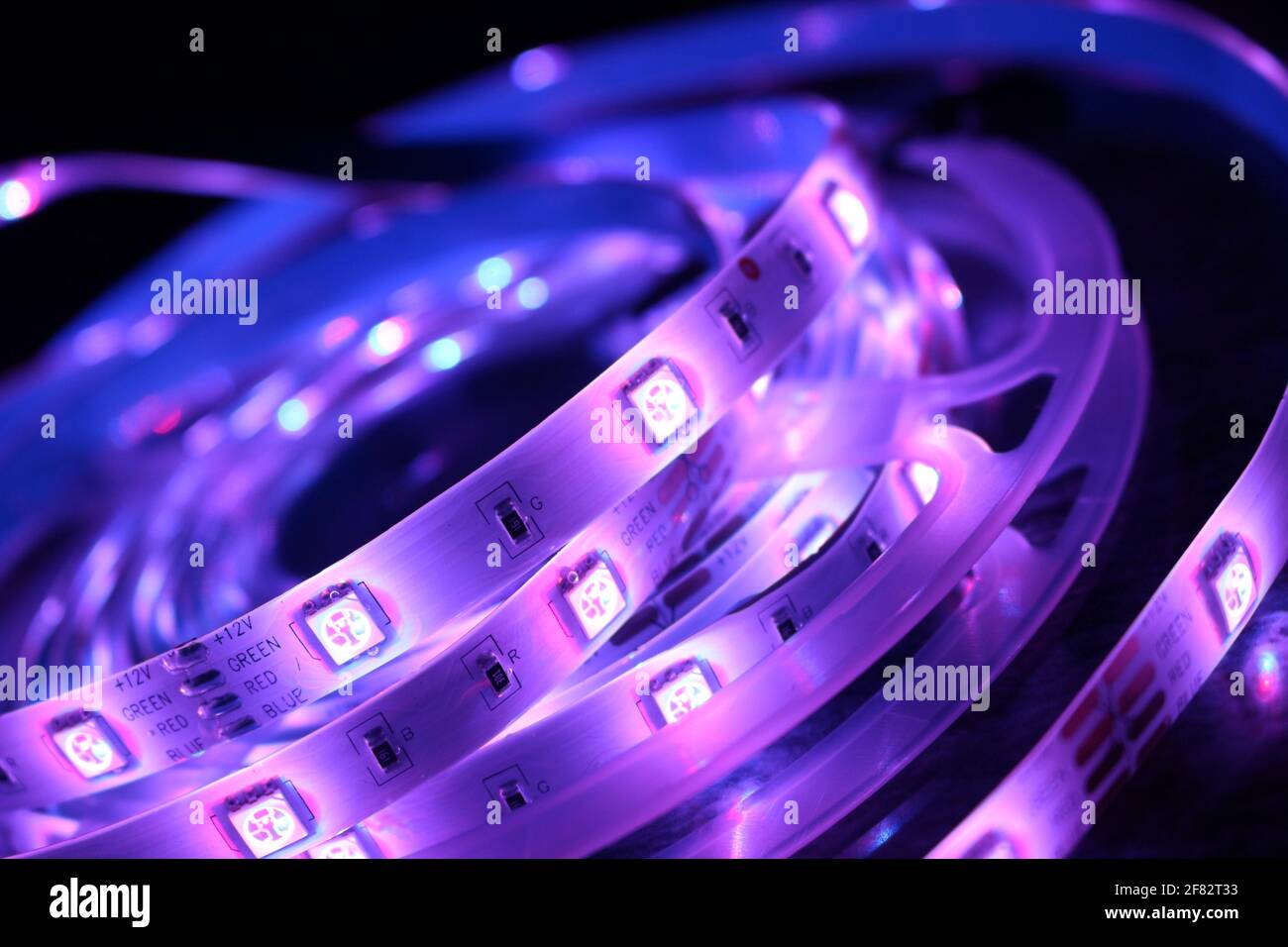 A closeup shot of a roll of illuminated purple led lights Stock Photo ...