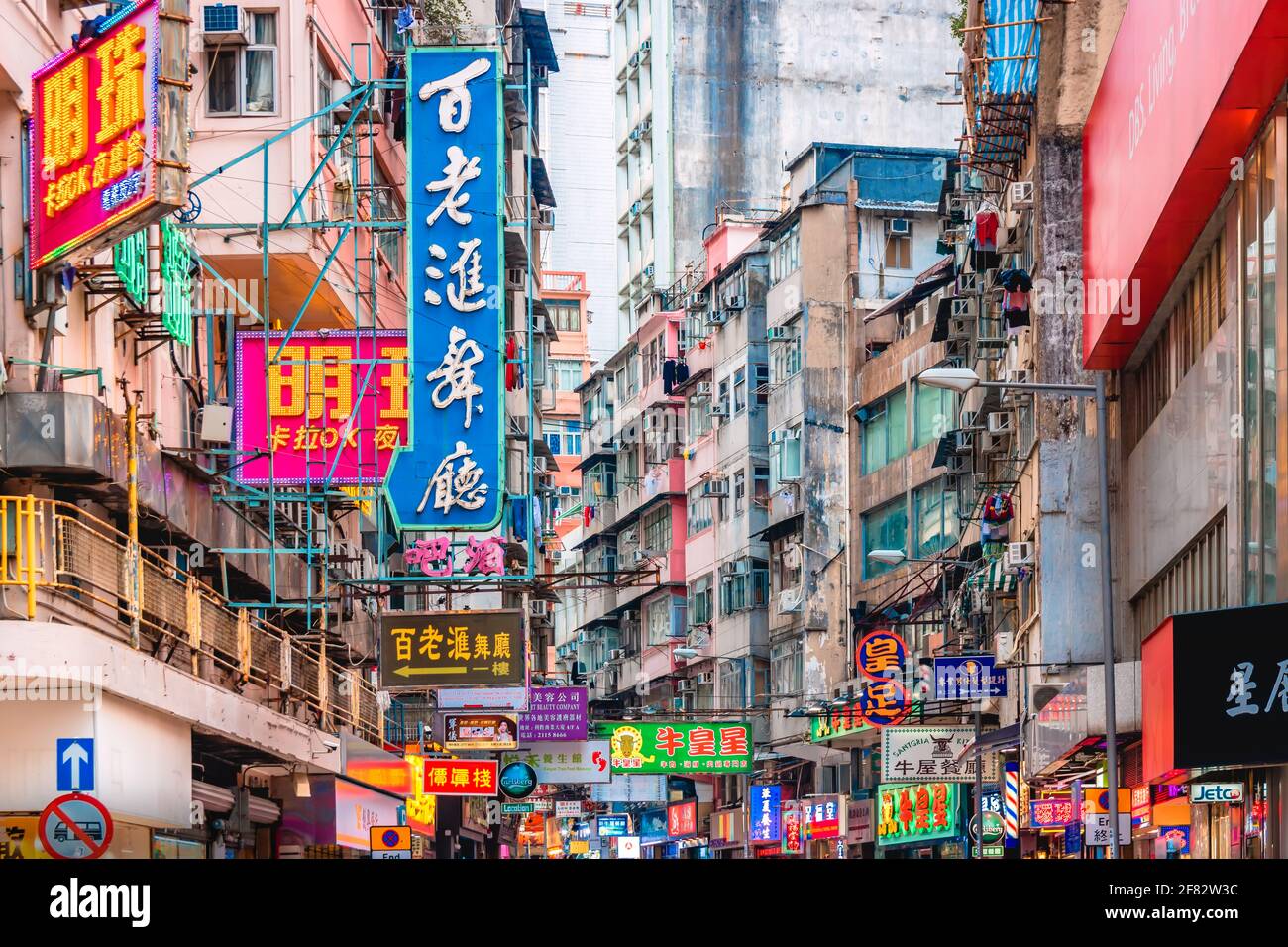 Hong Kong - 07 February 2018 - Futuristic View of Dense Chinese Signage in Dystopian Urban City Setting, Hong Kong Stock Photo