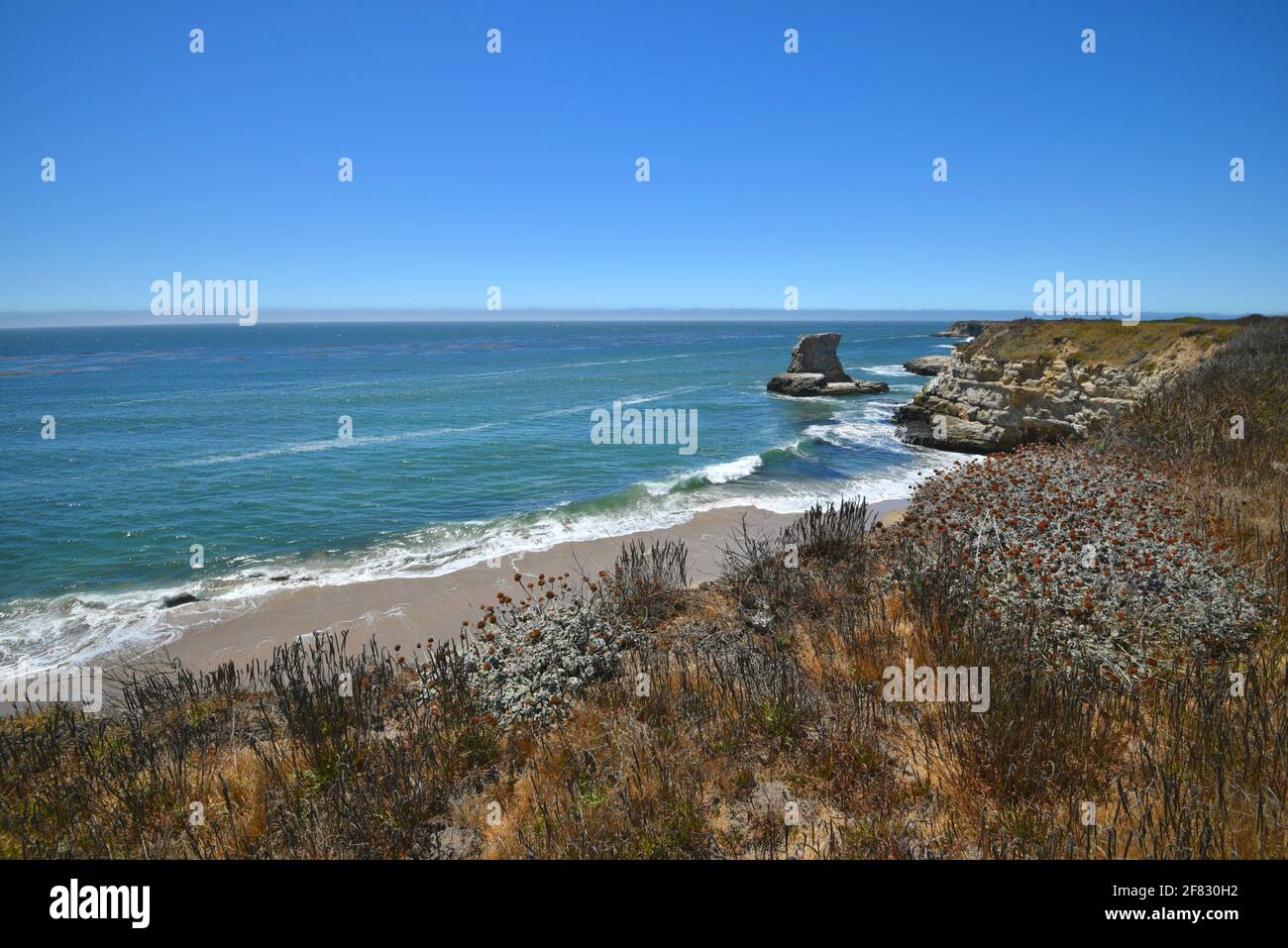 Santa Cruz Rocks Scenic landscape with a rock formation on the shoreline of Little ...