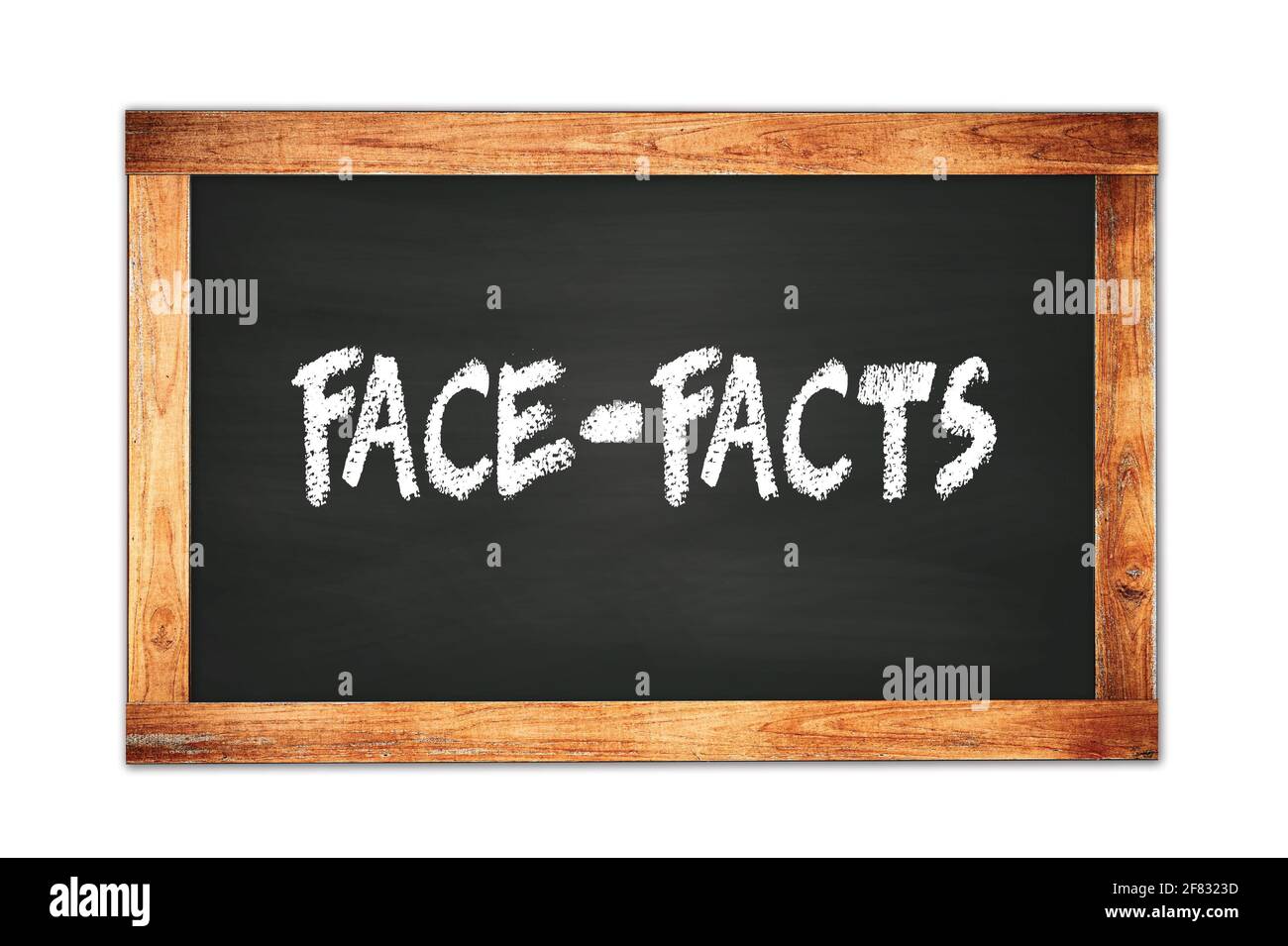 FACE-FACTS text written on black wooden frame school blackboard. Stock Photo