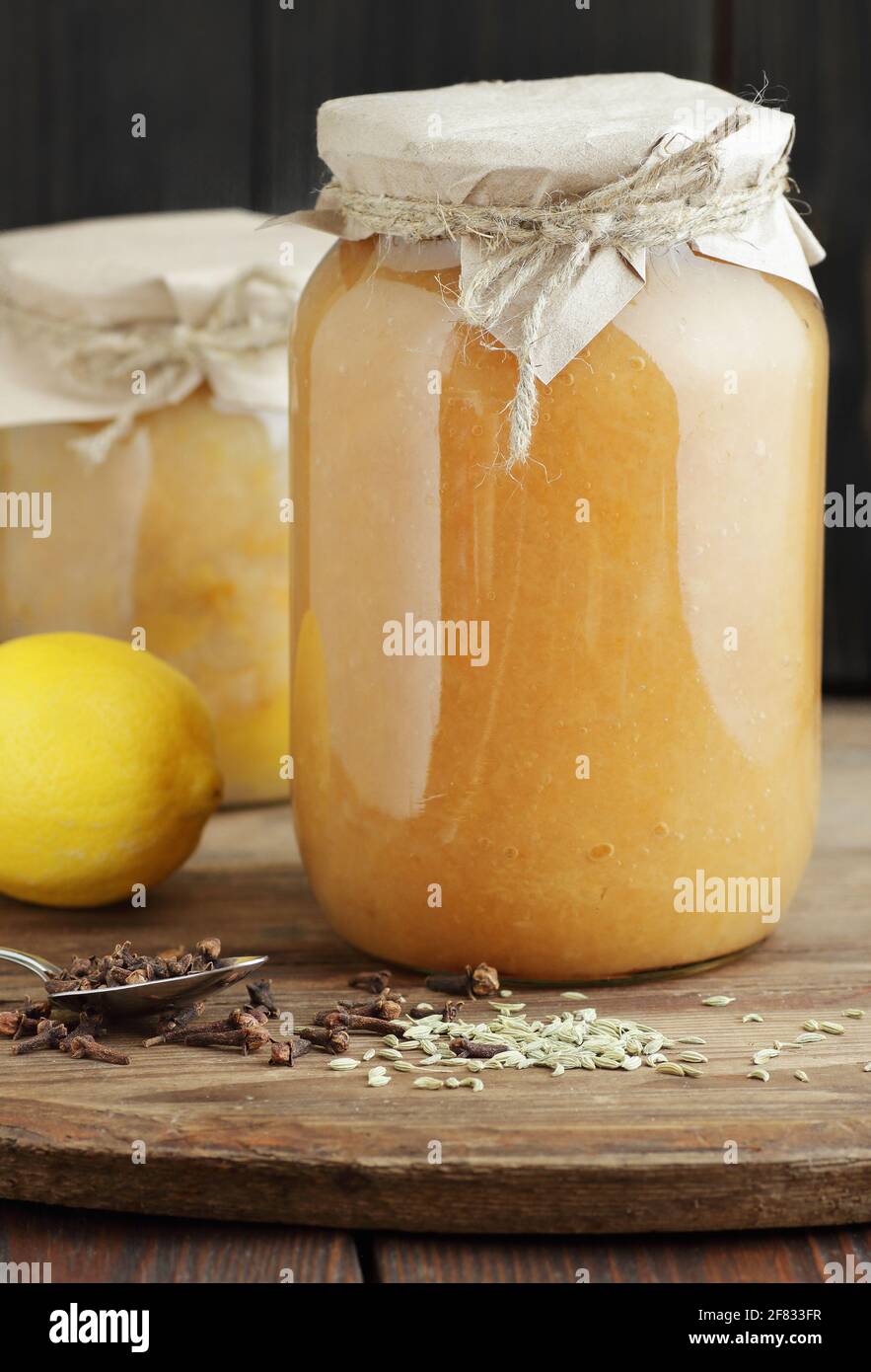 Apple jam jars canned in plastic free glass cans on wooden rustic