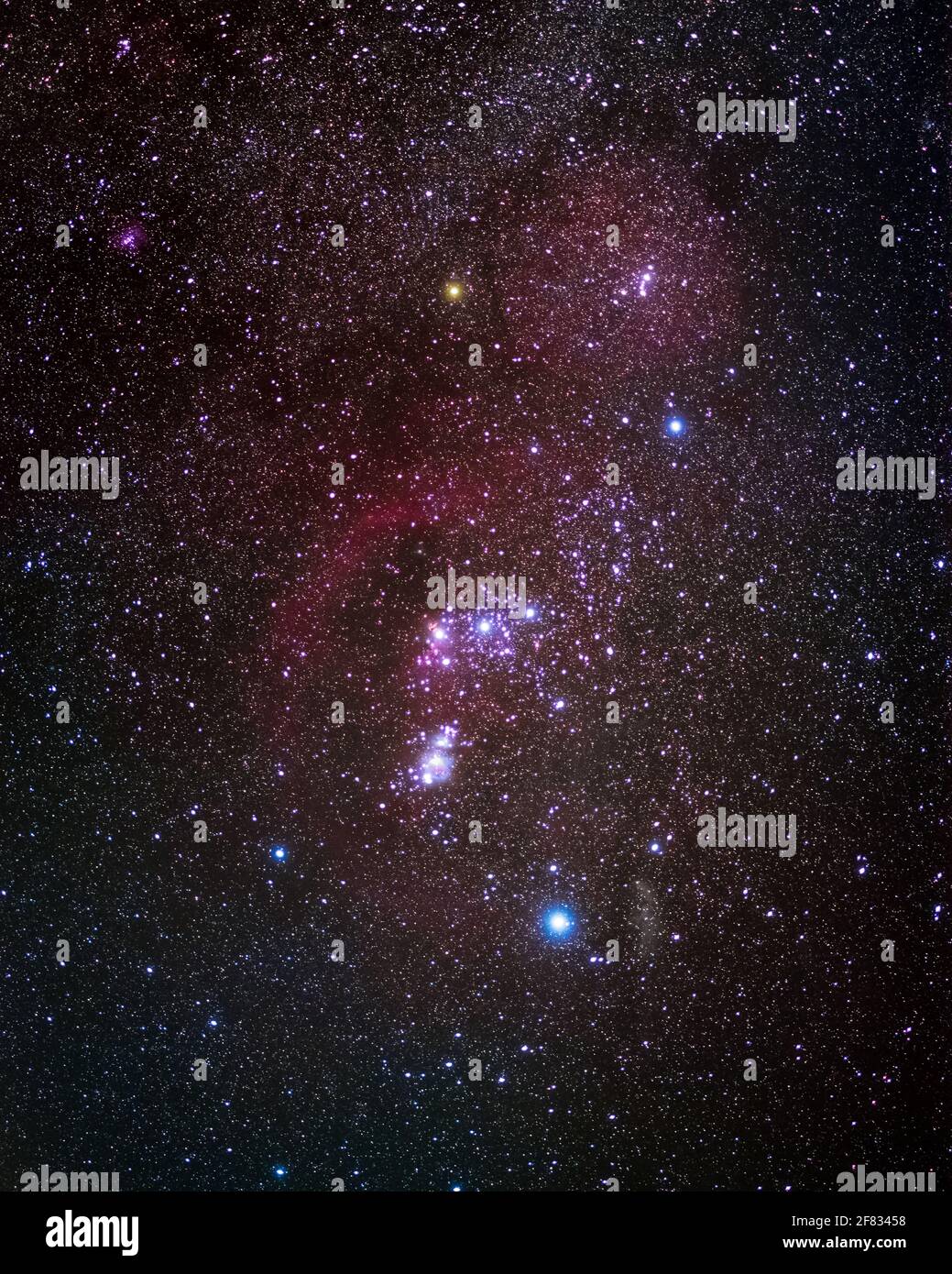 The Orion Molecular Cloud Complex showing its many colorful nebula alongside the Winter Milky Way, taken in Shenandoah National Park. Stock Photo