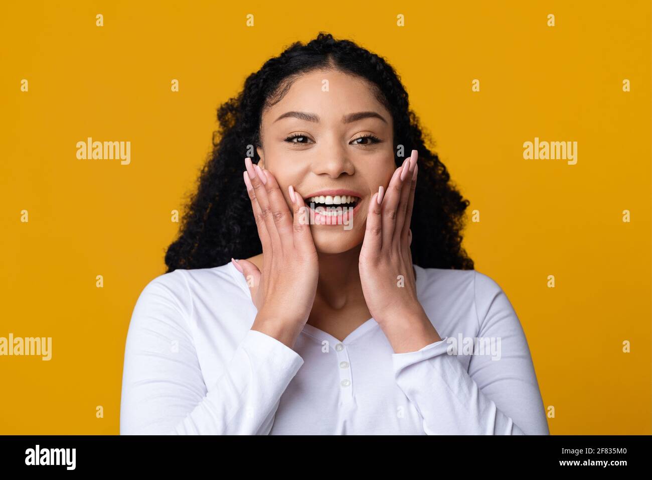 Happy Excitement. Portrait Of Surprised African American Lady Touching ...