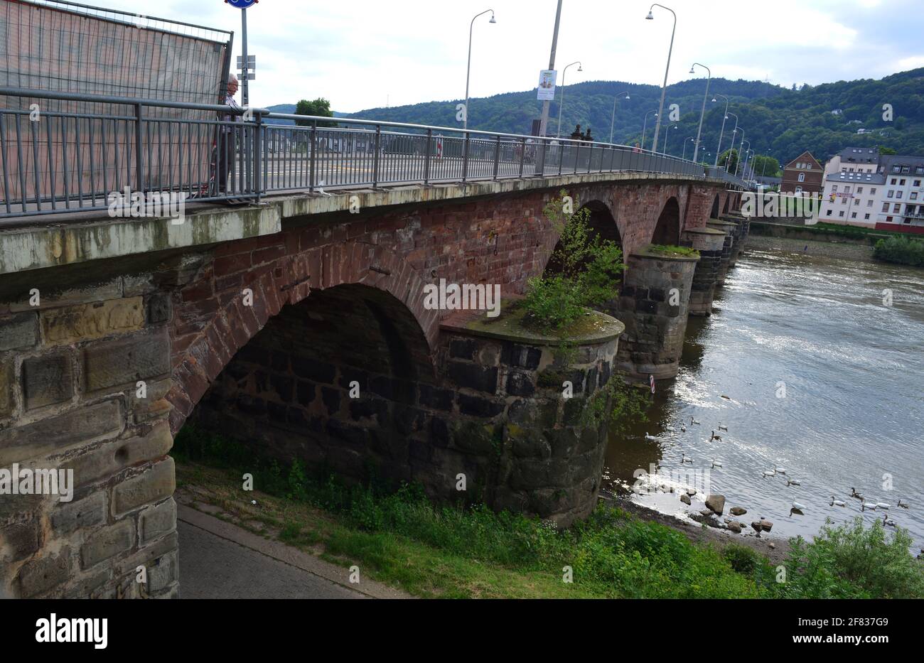 A view of the Römerbrücke, ancient Roman times bridge over the Mosel river, Trier, Germany Stock Photo