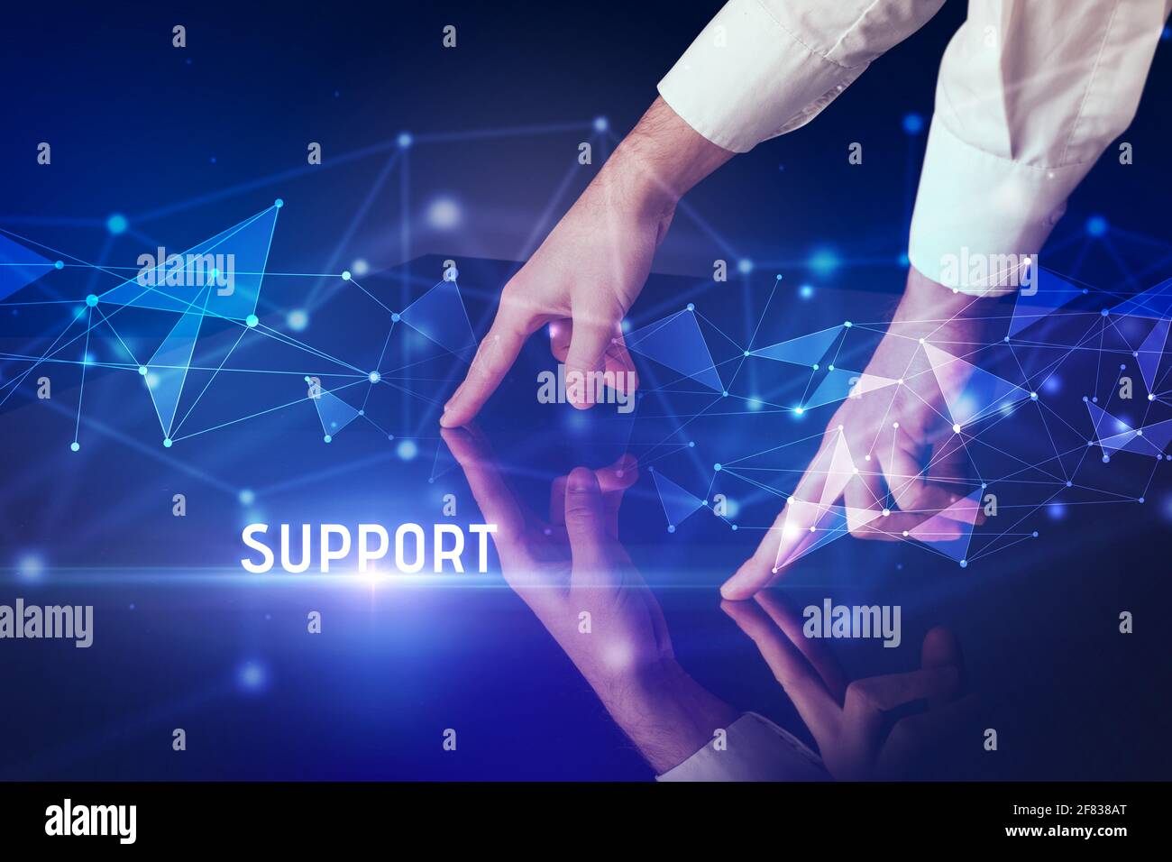 Businessman touching huge screen concept Stock Photo