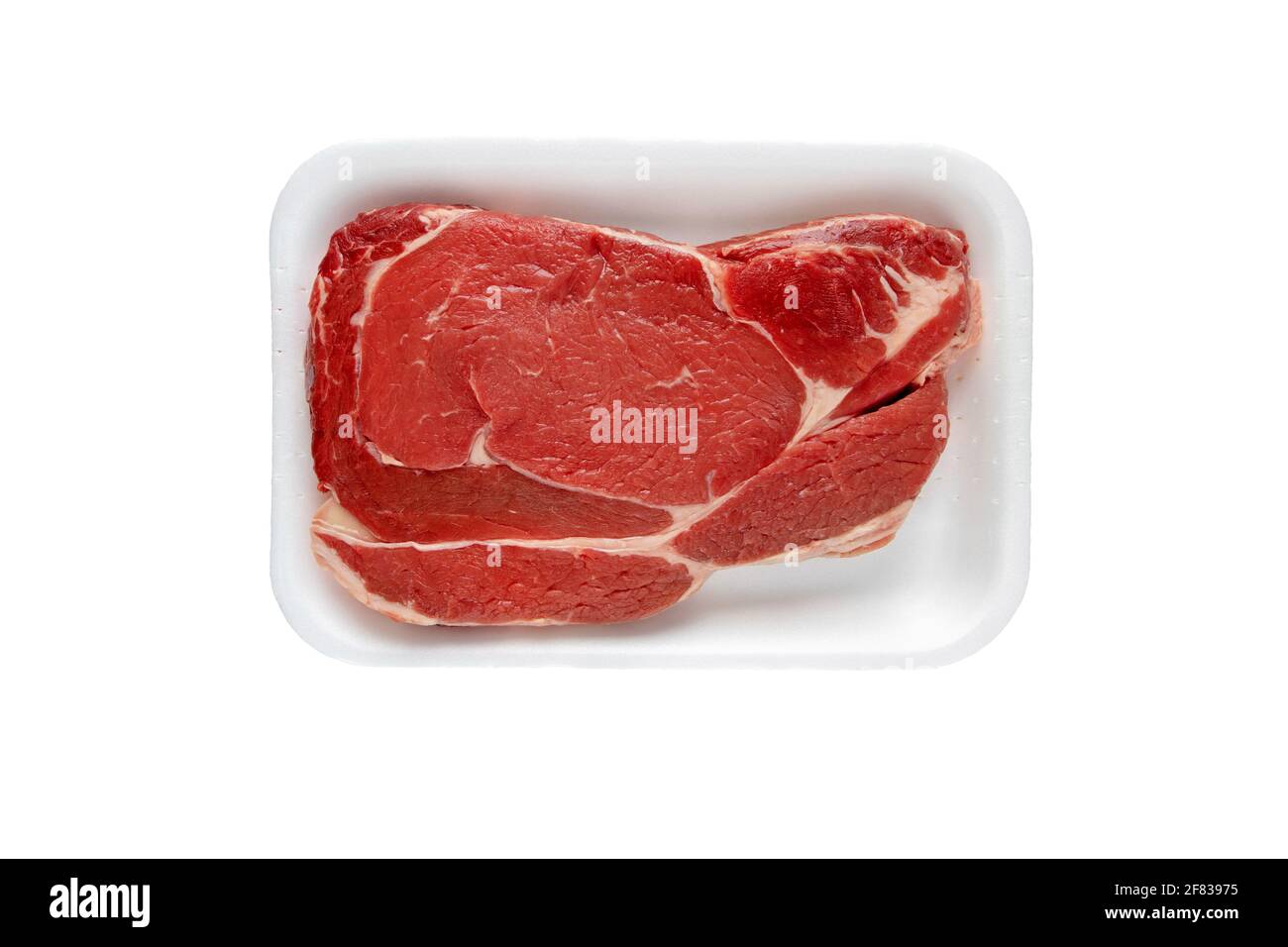 Juicy raw meat cut. Beef entrecote slice in the plastic foam tray