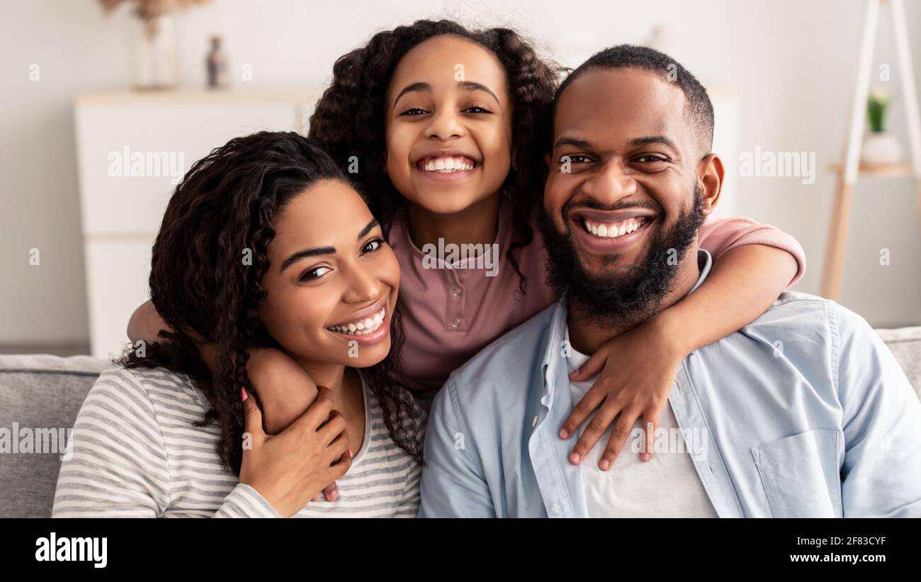 Portrait of a happy black family smiling at home Stock Photo - Alamy