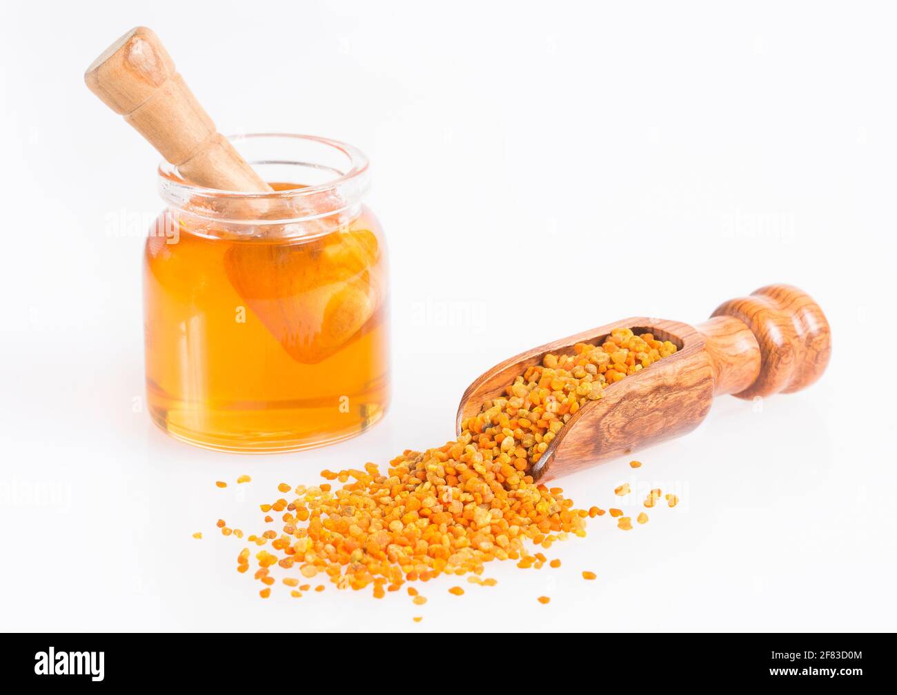 Bee honey and pollen grains Stock Photo