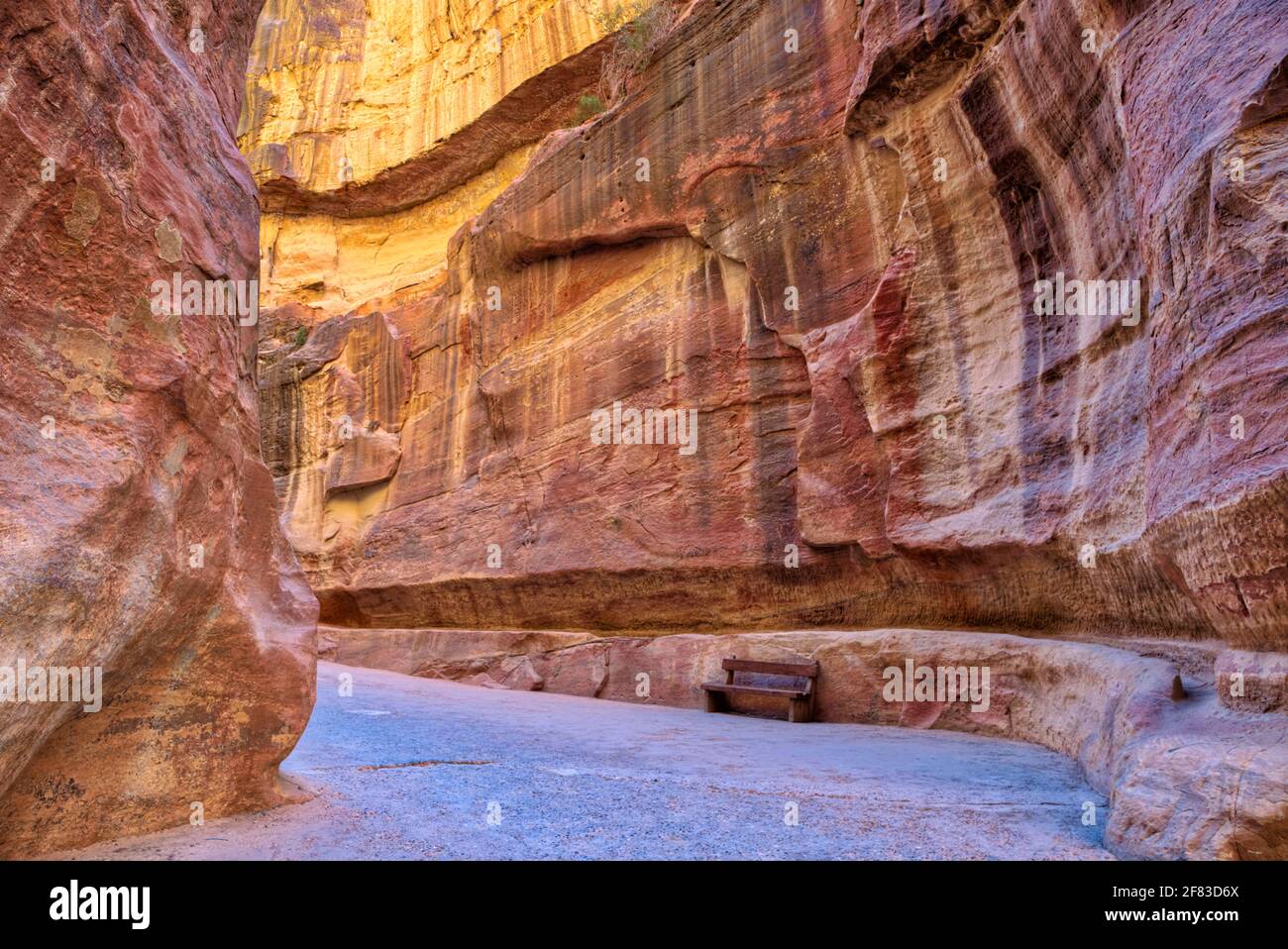 Also known as Siqit, the main entrance in Petra is a dim, narrow gorge (in some points no more than 3 metres (10 ft) wide) winds its way approximately Stock Photo