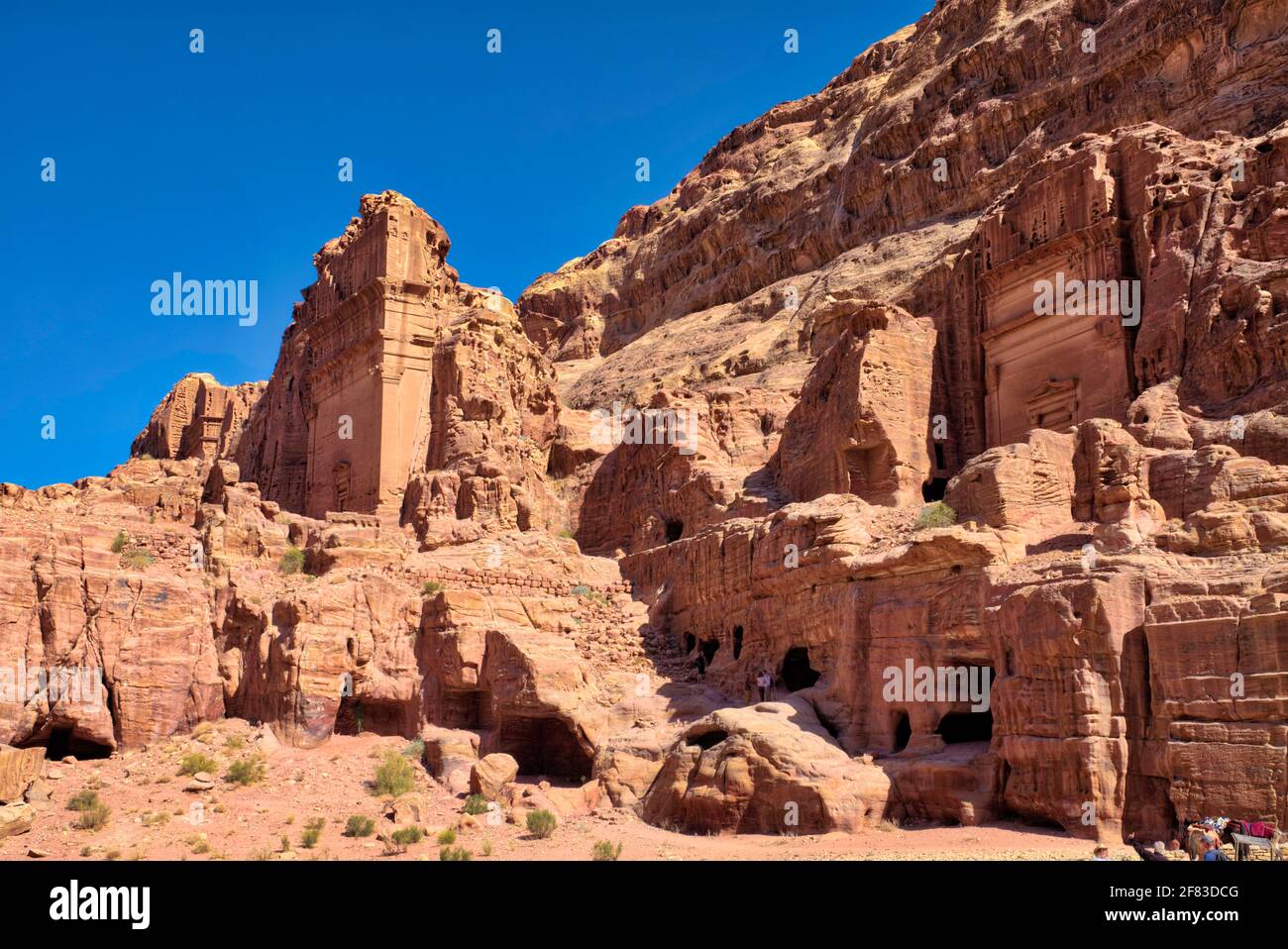 This tomb carved by the Nabateans in the face of Jabal al-Khubtha, the mountain overlooking Petra on the East and is dedicated to a member of the Naba Stock Photo