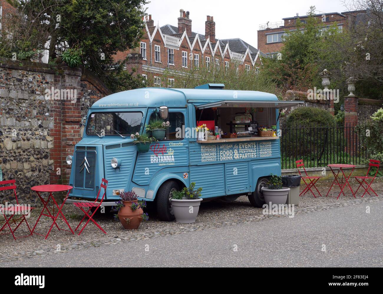 Old-fashioned Blue Citroen Mobile Catering Van serving Food & Drink, in historic setting near Norwich Cathedral, Norwich, Norfolk, England, UK, Stock Photo