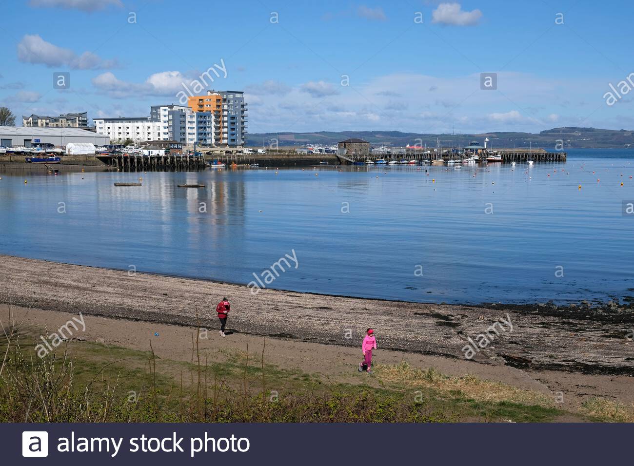 Granton harbour and Wardie Bay with a view over the Forth Estuary on a sunny day, Edinburgh, Scotland Stock Photo