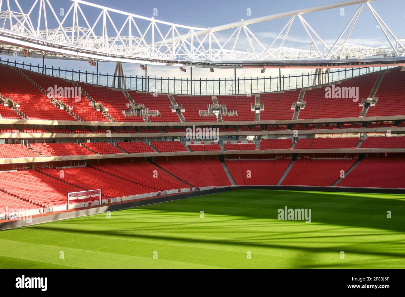 A view of the pitch and an empty Emirates Stadium, Arsenal Football Club, North London, UK Stock Photo