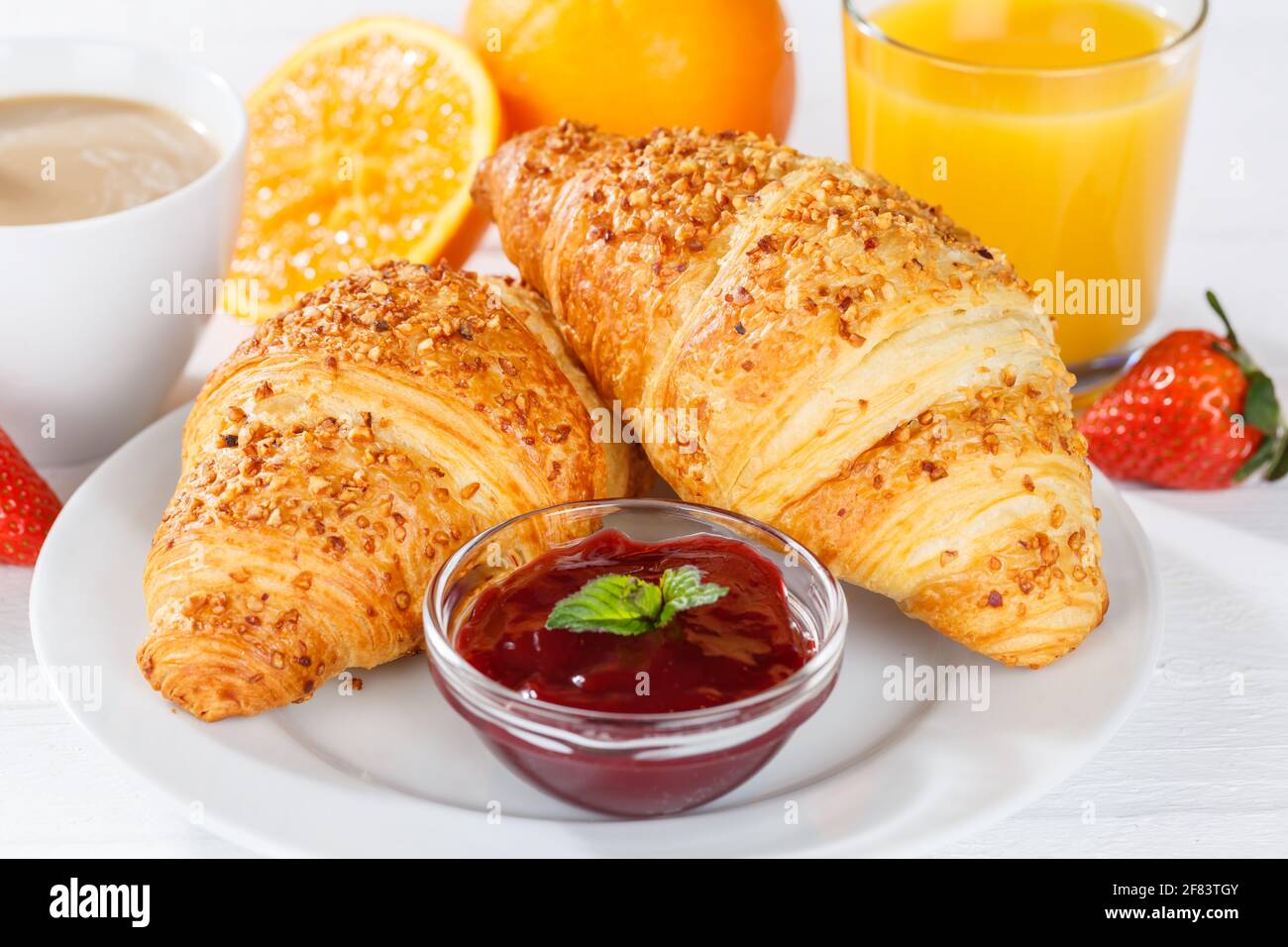 Croissant breakfast croissants orange juice coffee food hotel buffet jam marmelade Stock Photo