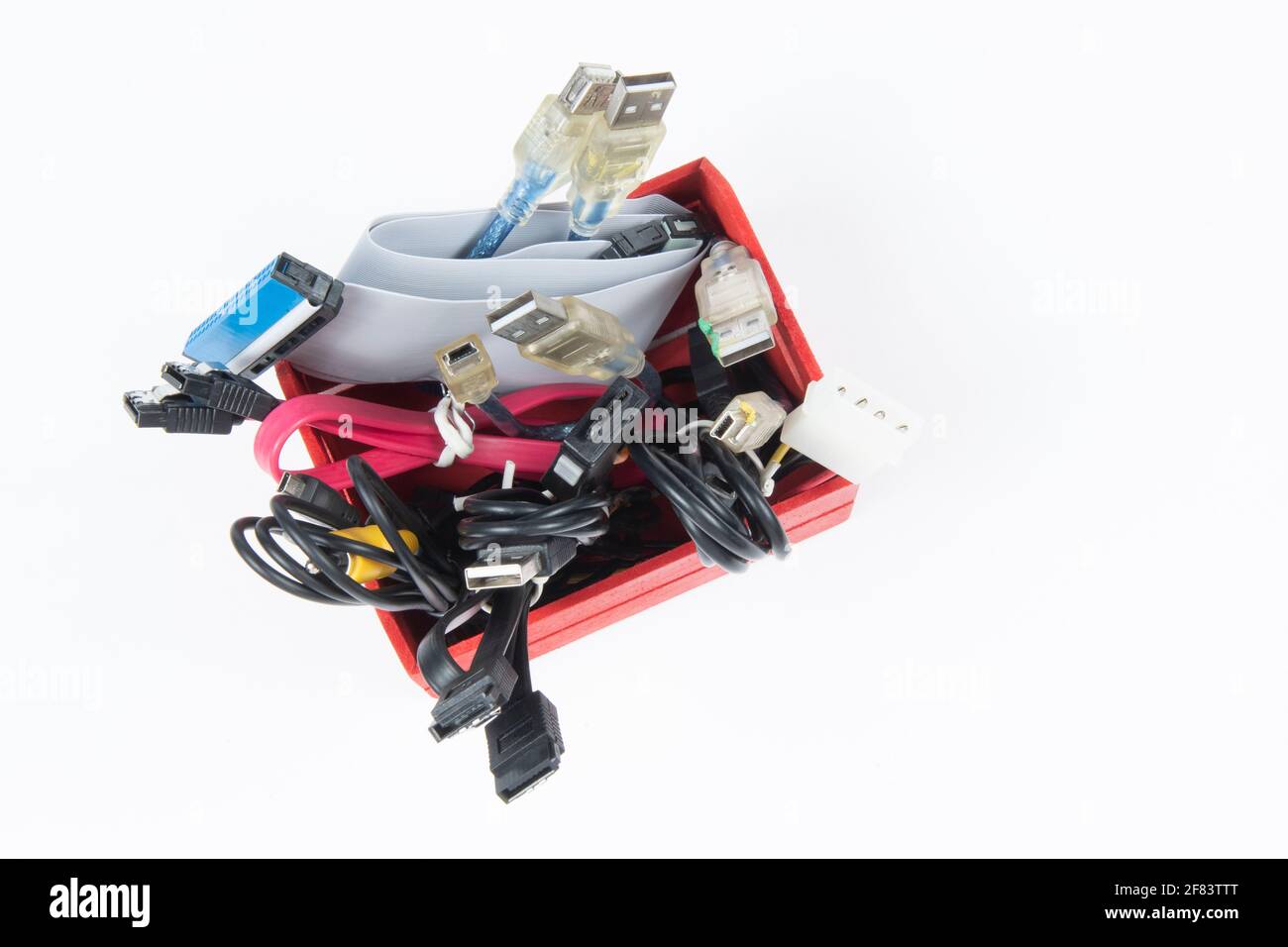 technological waste that remains in residence as computer cables Stock Photo