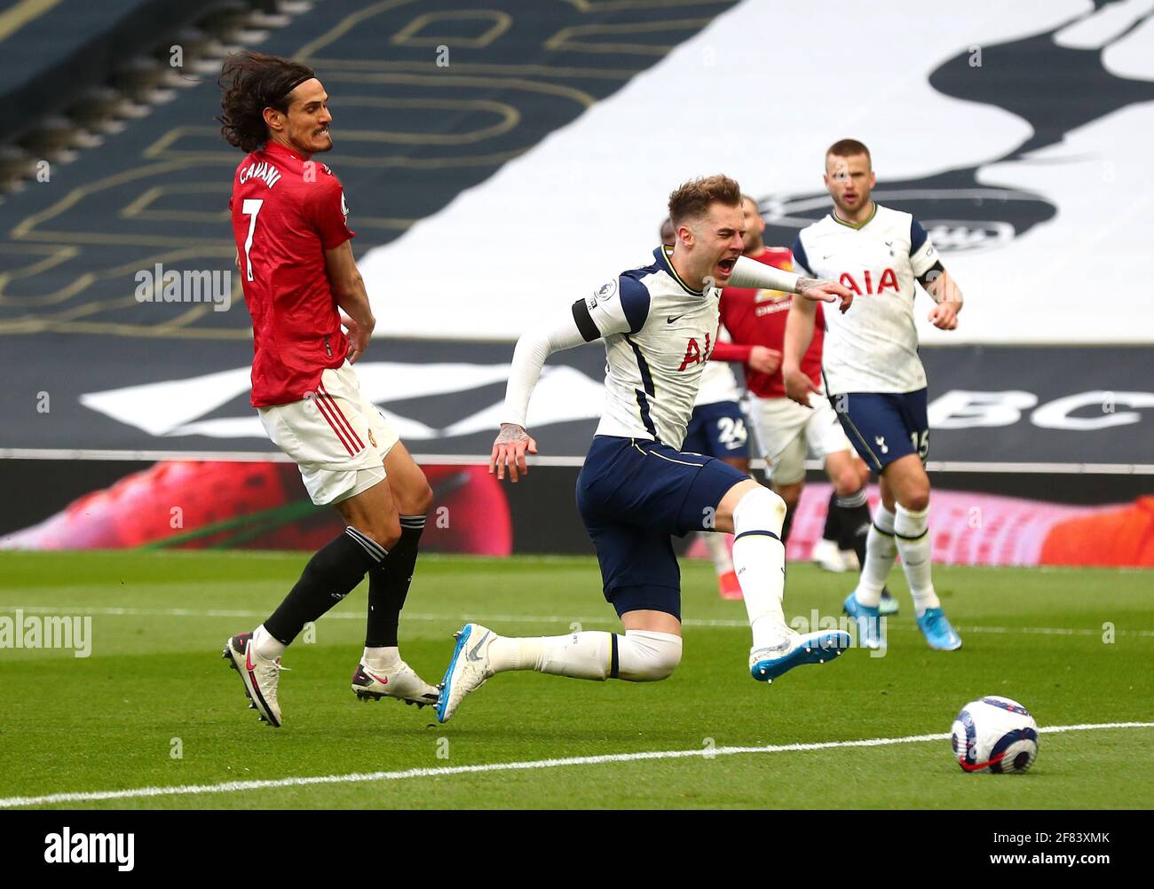 Manchester United's Edinson Cavani (left) fouls Tottenham Hotspurs