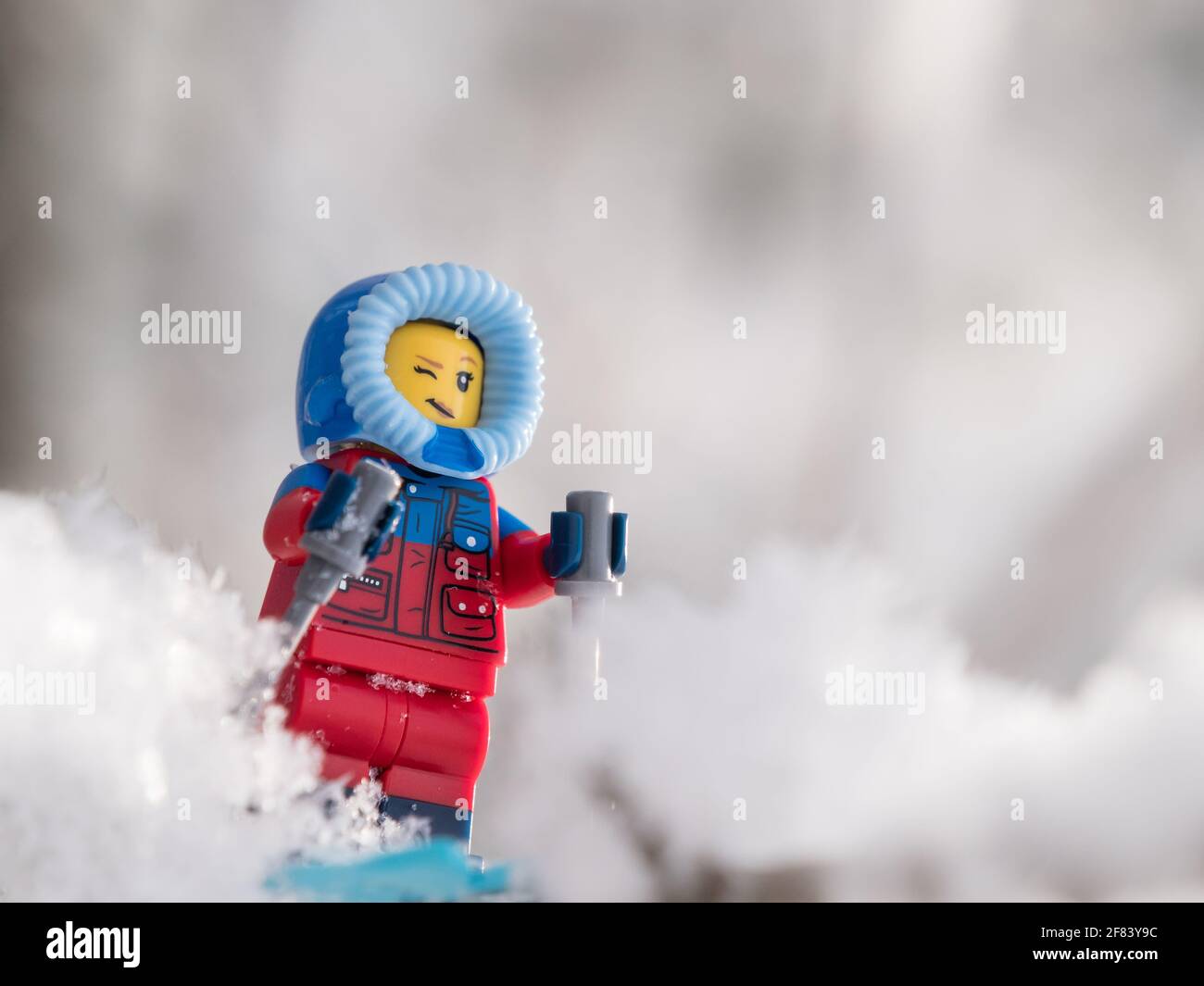 Lego skier minifigure smiling surrounded by snow Stock Photo - Alamy