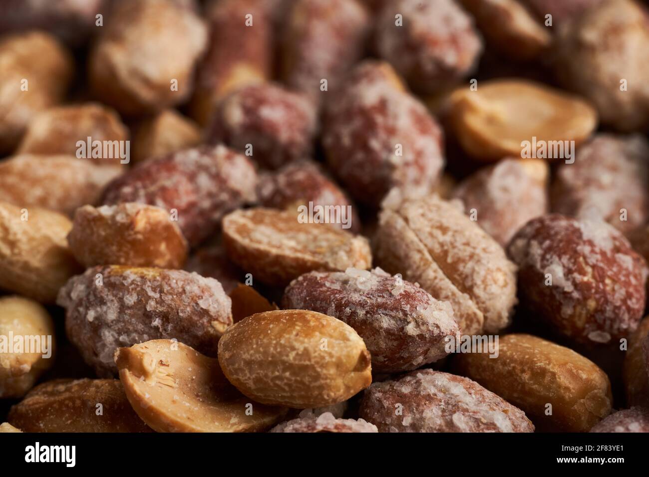 Oven baked peanuts in skin, heavily salted Stock Photo Alamy
