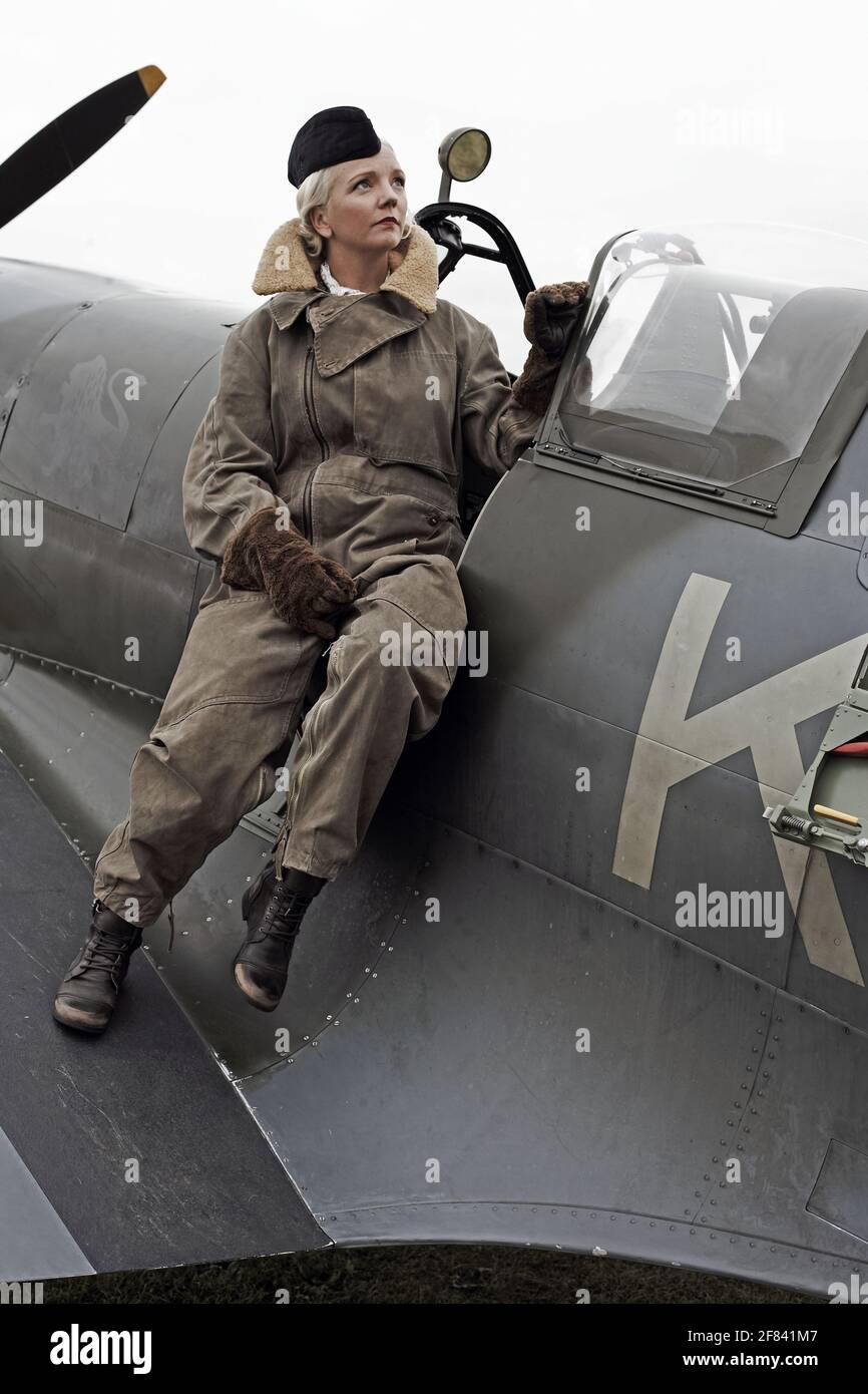 re-enactment of a World War II Air Transport Auxiliary Pilot at Goodwood Revival , Uk WW2 airfield renactment at The Goodwood Revival. Stock Photo